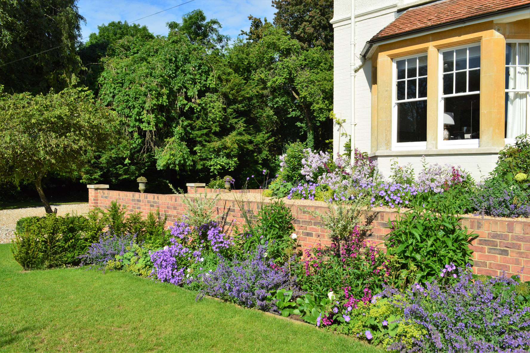 Garden design with long herbaceous border