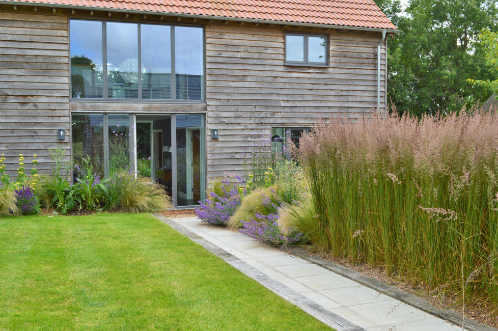 Contemporary garden design with Calamagrostis 'Karl Foerster'