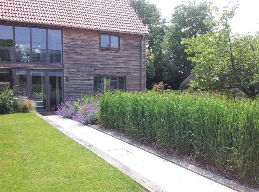 Contemporary garden design with Calamagrostis 'Karl Foerster'